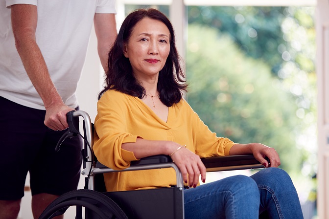 Caring Touch caregiver assisting client with transportation needs